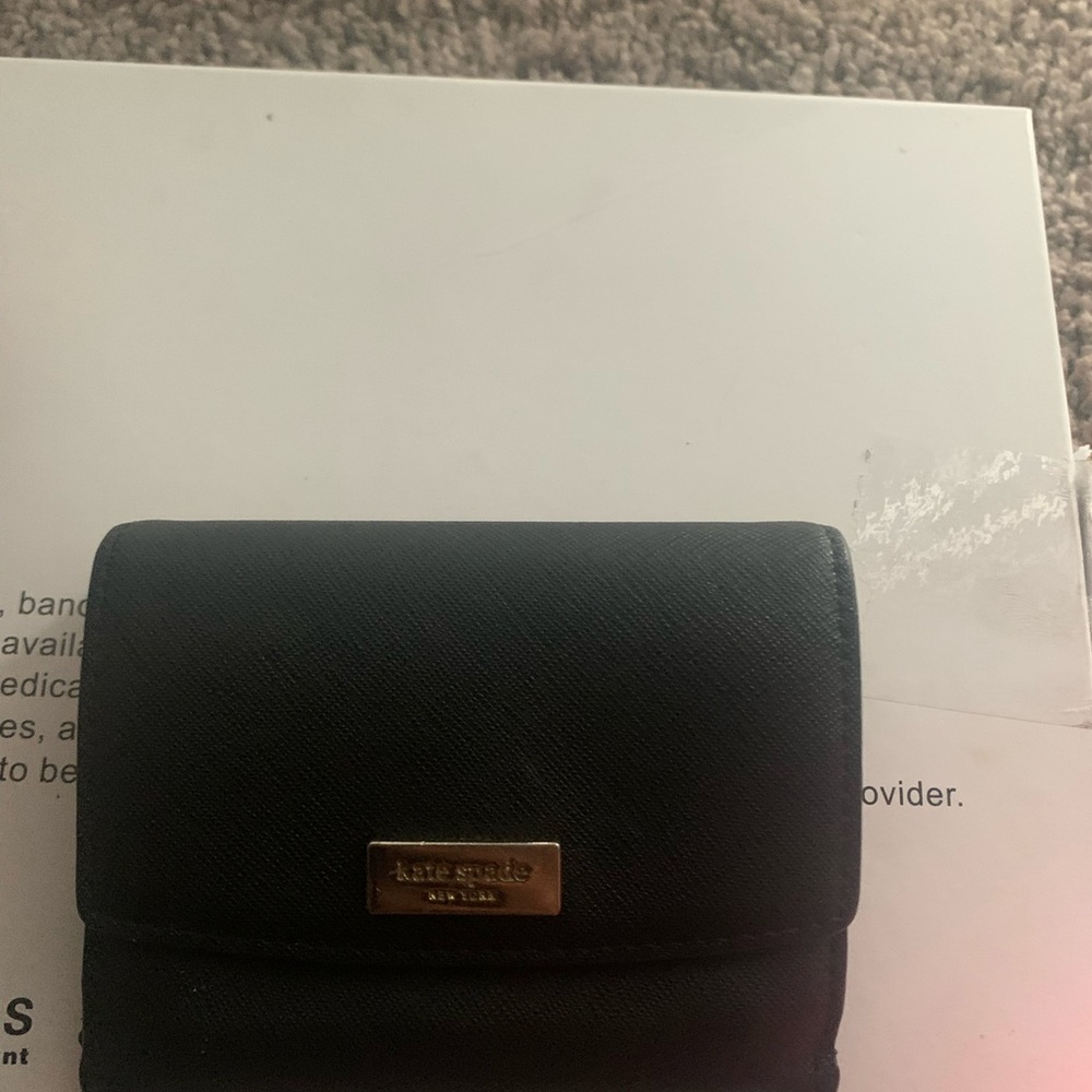 kate spade black leather trifold wallet with gold logo plaque